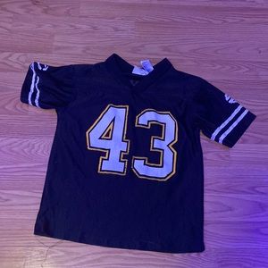 This is a 100% polyester Troy Polamalu jersey